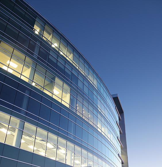 Glass office at dusk